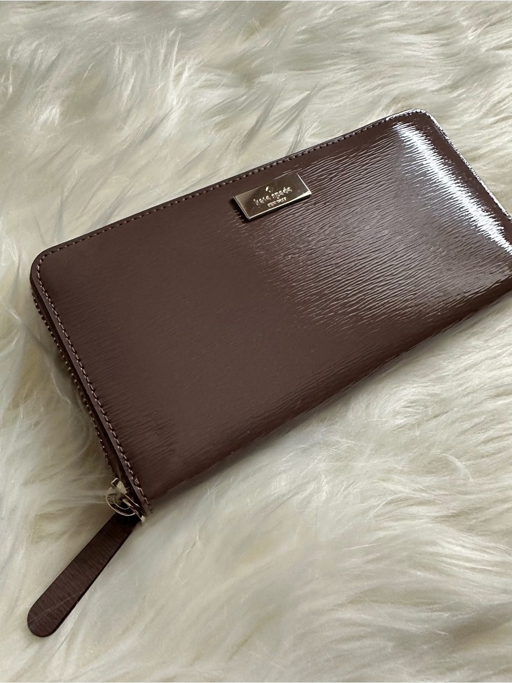 Kate Spade patent leather wallet.